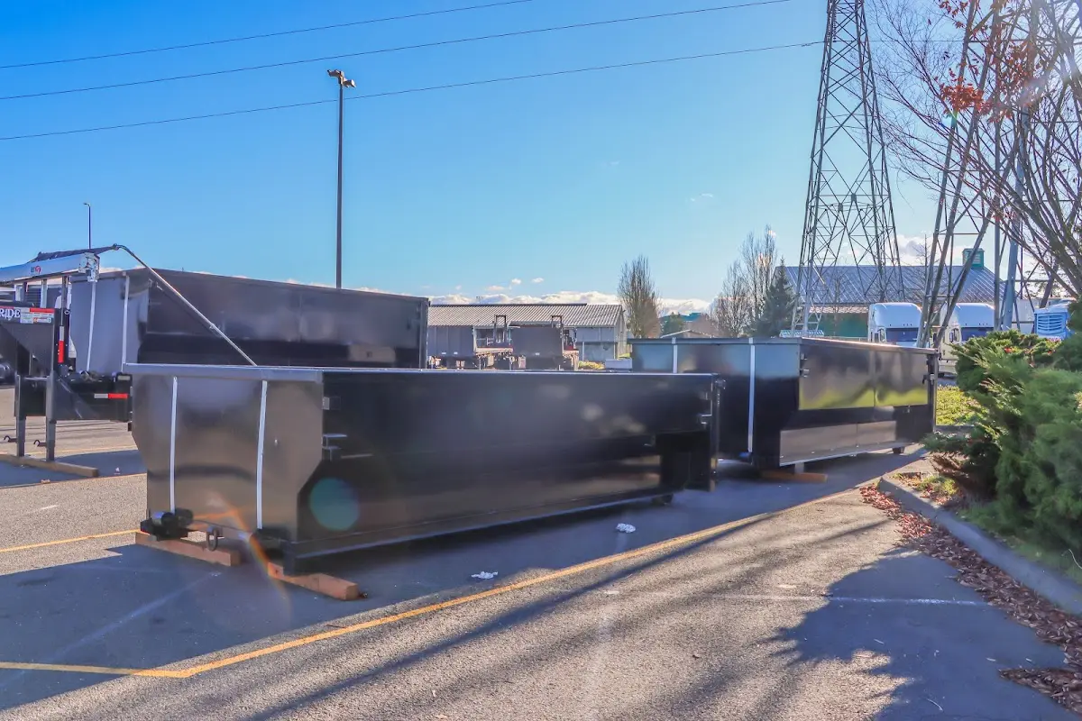 Roll-off dumpster ready for waste disposal at job site for 2 Yard Dumpster Rental in Stephenville